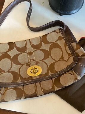 Coach Brown Signature Canvas Shoulder Bag with Gold Turnlock no hang tag.